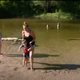 Reporters for WDIV local 4 telling parents about the spill. The parents immediately dragged their kids out of the potentially toxic water.
